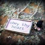 Obey Thy Heart Soldered Glass Pendant Necklace..